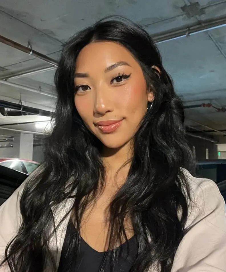 OnlyFans girl demonstrating lighting techniques for quality photos